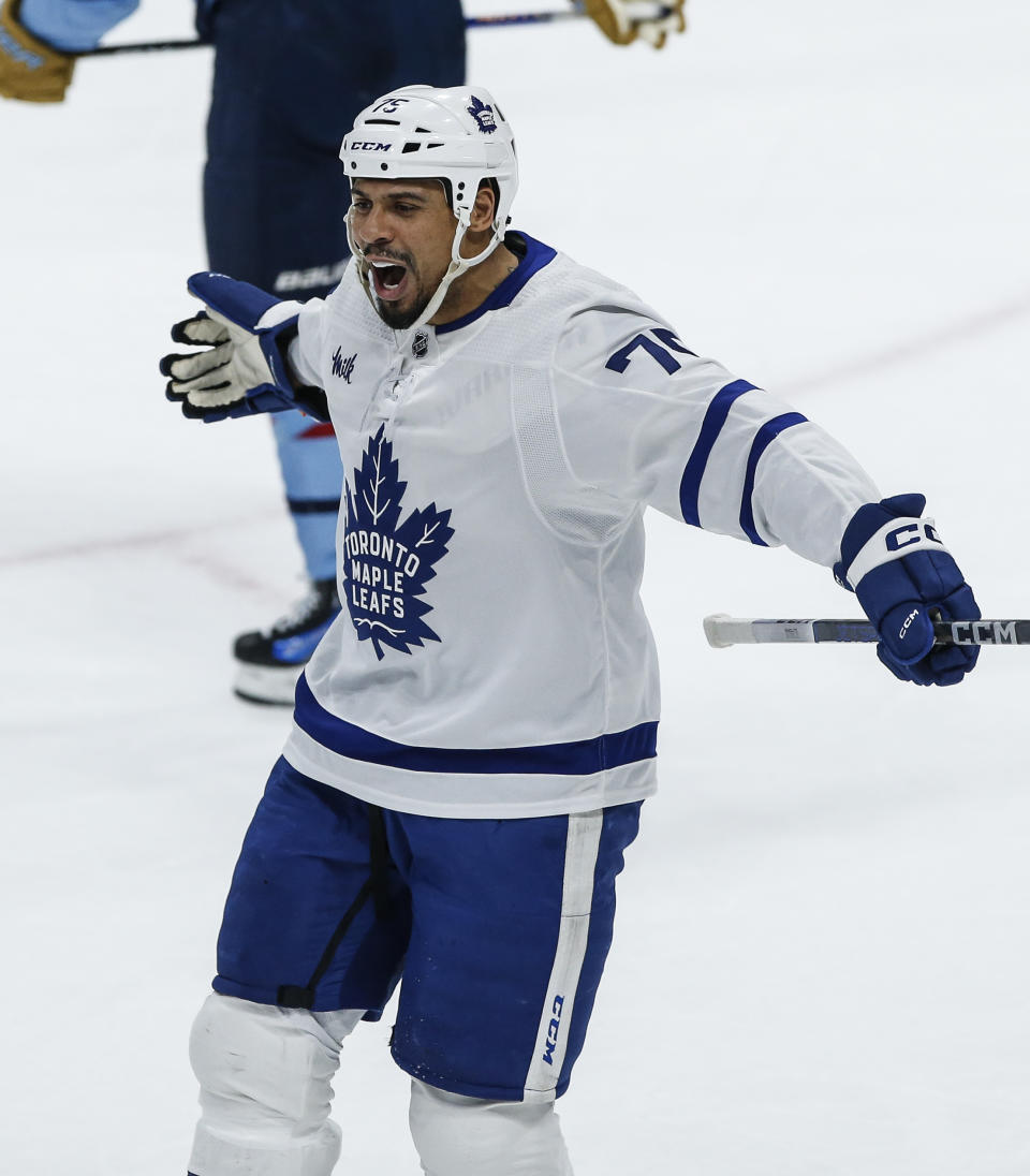 Toronto Maple Leafs' Ryan Reaves (75) celebrates his goal against the Winnipeg Jets during the first period of an NHL hockey game, Saturday, Jan. 27, 2024, Winnipeg, Manitoba. (John Woods/The Canadian Press via AP)