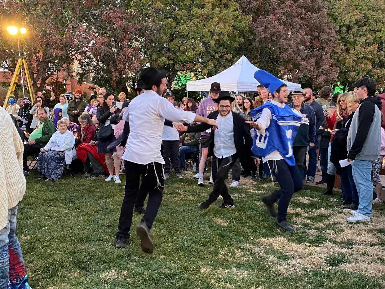 Locals participate in a dance during the Grand Menorah Lighting ceremony at Town Square in St. George on Nov. 28, 2021. The 2022 event is scheduled for this Sunday, Dec. 18, with another event in Cedar City on Monday, Dec. 19.
