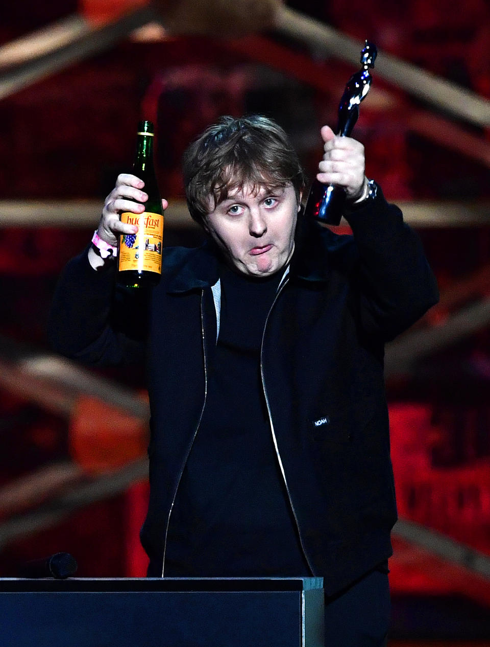 LONDON, ENGLAND - FEBRUARY 18: (EDITORIAL USE ONLY) Lewis Capaldi accepts the Song of the Year Award during The BRIT Awards 2020 at The O2 Arena on February 18, 2020 in London, England. (Photo by Gareth Cattermole/Getty Images)