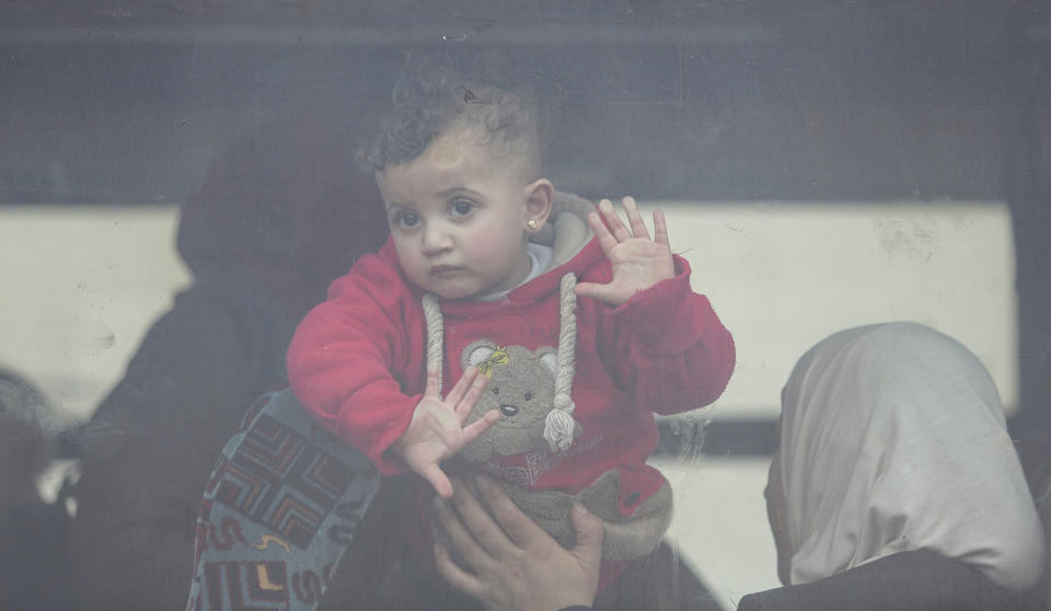 Thousands of Palestinians crowd the Gaza Rafah border crossing with Egypt