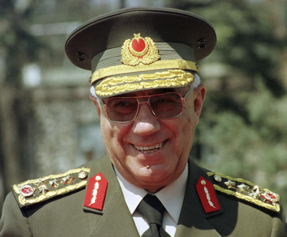 FILE - General Ismail Hakki Karadayi, then-Turkish Chief of Staff, smiles during a welcoming ceremony for President Geidar Aliev of Azerbaijan in Ankara, Turkey, on Monday, May 5, 1997. Turkish President Recep Tayyip Erdogan on Friday, May 17, 2024, pardoned seven former top military officers who were sentenced to life terms in prison over the ouster of an Islamic-led government in 1997. The main defendant, former Chief of General Staff Ismail Hakki Karadayi, died in 2020, while the appeals process was still continuing. (AP Photo/Burhan Ozbilici, File)
