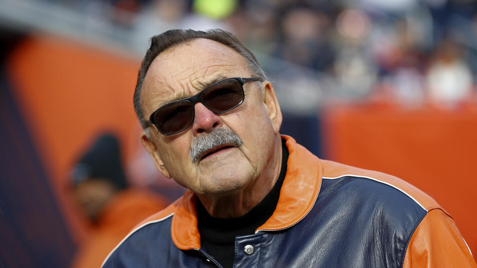 FILE - Former Chicago Bears linebacker Dick Butkus watches during the first half of an NFL football game between the Bears and the New York Giants in Chicago, Nov. 24, 2019. Butkus, a fearsome middle linebacker for the Bears, has died, the team announced Thursday, Oct. 5, 2023. He was 80. According to a statement released by the team, Butkus' family confirmed that he died in his sleep overnight at his home in Malibu, Calif. (AP Photo/Paul Sancya, File)