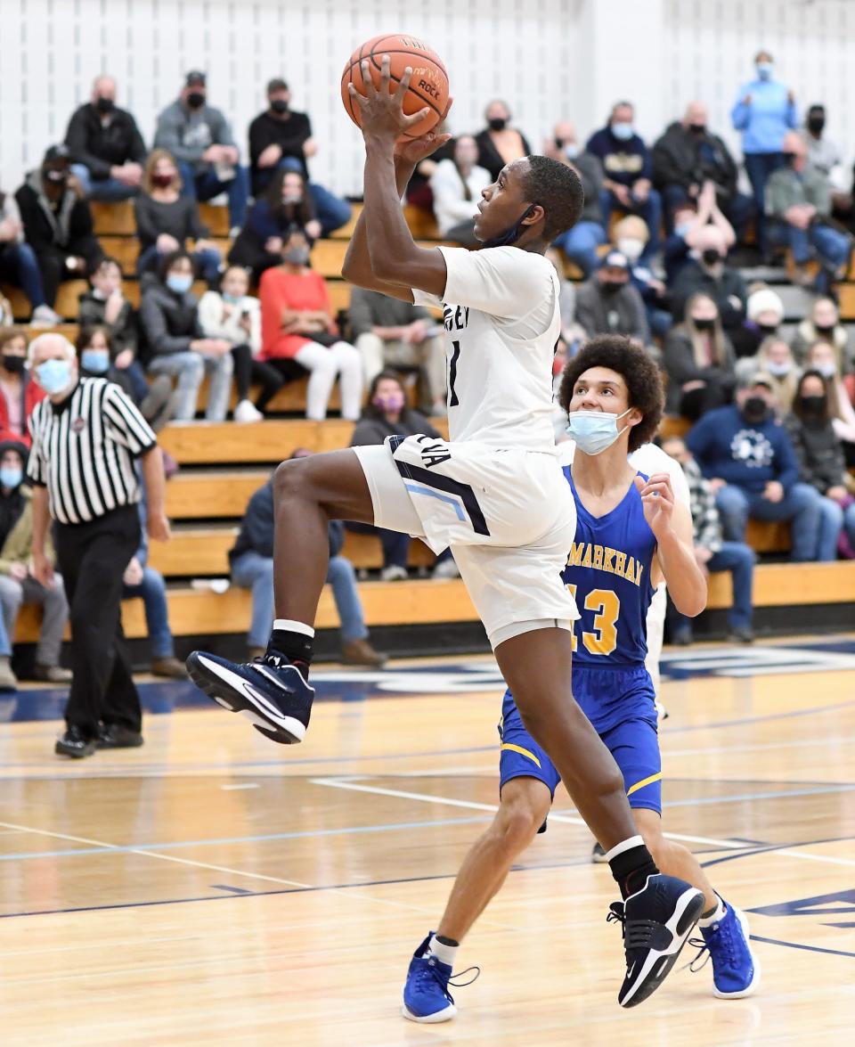 Central Valley Academy's Jaylon O'Neal goes up for a layup against Mt. Markham Tuesday.