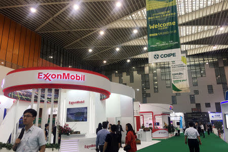 FILE PHOTO: A booth of U.S. major ExxonMobil is seen at the China (Dongying) International Petrochemical Trade Exhibition in Dongying, Shandong province, China May 29, 2018. Picture taken May 29, 2018. REUTERS/Chen Aizhu/File Photo