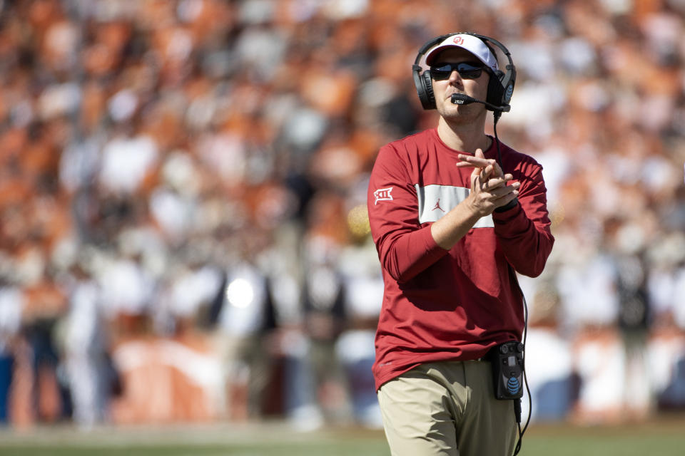 Oklahoma head coach Lincoln Riley applauds his team during the second half of an NCAA college football game against Texas at the Cotton Bowl, Saturday, Oct. 12, 2019, in Dallas. Oklahoma won 34-27. (AP Photo/Jeffrey McWhorter)