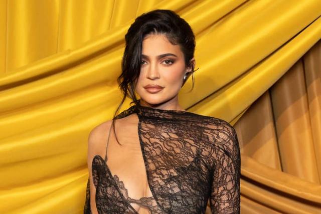 Kylie Jenner Stuns in an Orange Mini Dress: See Photos!