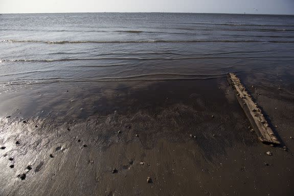 A year after the Deepwater Horizon spill,  public beaches along the Louisiana coast remained closed.