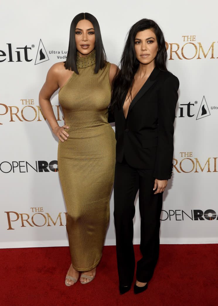 <i>Kim opted for a golden Versace gown [Photo: AP]</i>