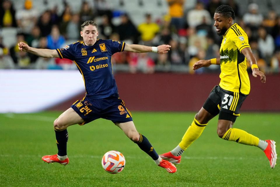 Apr 2, 2024; Columbus, OH, USA; Tigres UANL midfielder Marcelo Flores (24) fights for a ball with Columbus Crew defender Steven Moreira (31) during the first half of the Concacaf Champions Cup quarterfinal at Lower.com Field. Mandatory Credit: Adam Cairns-USA TODAY Sports