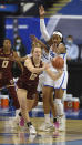 Boston College's Ally VanTimmeren, left, looks for help as she is guarded by Pittsburgh's Cynthia Ezeja in the opening round of the Atlantic Coast Conference Tournament, Wednesday, March 3, 2021, at the Greensboro Coliseum in Greensboro, N.C. (Walt Unks/The Winston-Salem Journal via AP)