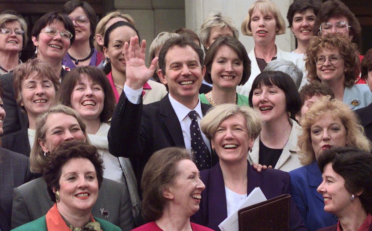 Tony Blair surrounded by some of the 101 new woman Labour MPs on first day of his new Parliament 1997