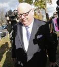 Senator Mike Duffy arrives on Parliament Hill in Ottawa October 22, 2013. The Senate is debating whether to suspend senators Duffy, Pamela Wallin and Patrick Brazeau without pay. REUTERS/Chris Wattie (CANADA - Tags: POLITICS)