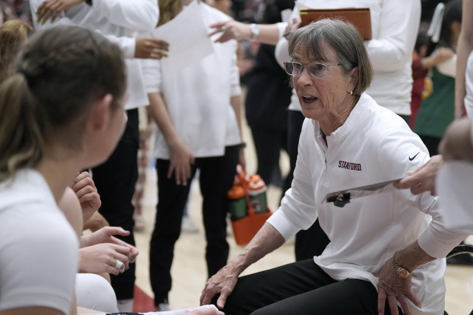 Stanford head coach Tara VanDerveer talks with her players during a time out against Oregon in the first half of an NCAA college basketball game Friday, Jan. 19, 2024, in Stanford, Calif. (AP Photo/Tony Avelar)