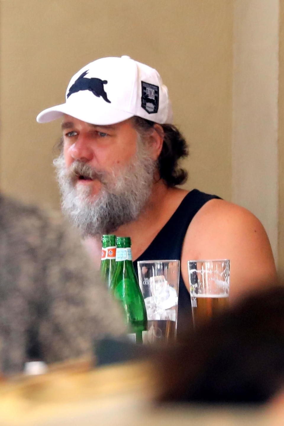 To cool himself off later in the day, the 54-year-old enjoyed a nice refreshing beverage. Source: Backgrid