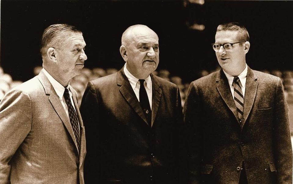 UK coaches Harry Lancaster, Adolph Rupp and Joe B. Hall were photographed in Memorial Coliseum after a game during the 1968-69 season.