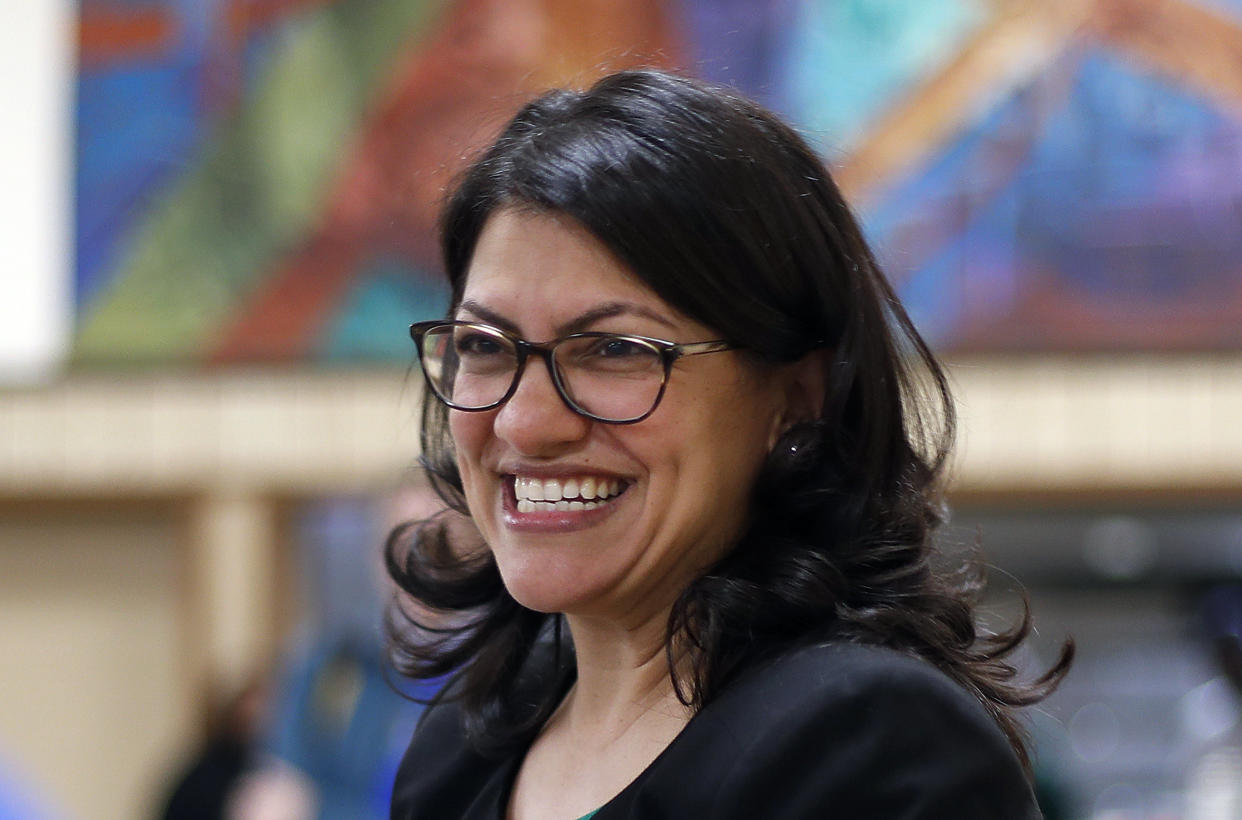 Rashida Tlaib smiles during a rally in Dearborn, Michigan, in October. The representative-elect said she plans to wear a Palestinian thobe when she's sworn into Congress in January. (Photo: ASSOCIATED PRESS)