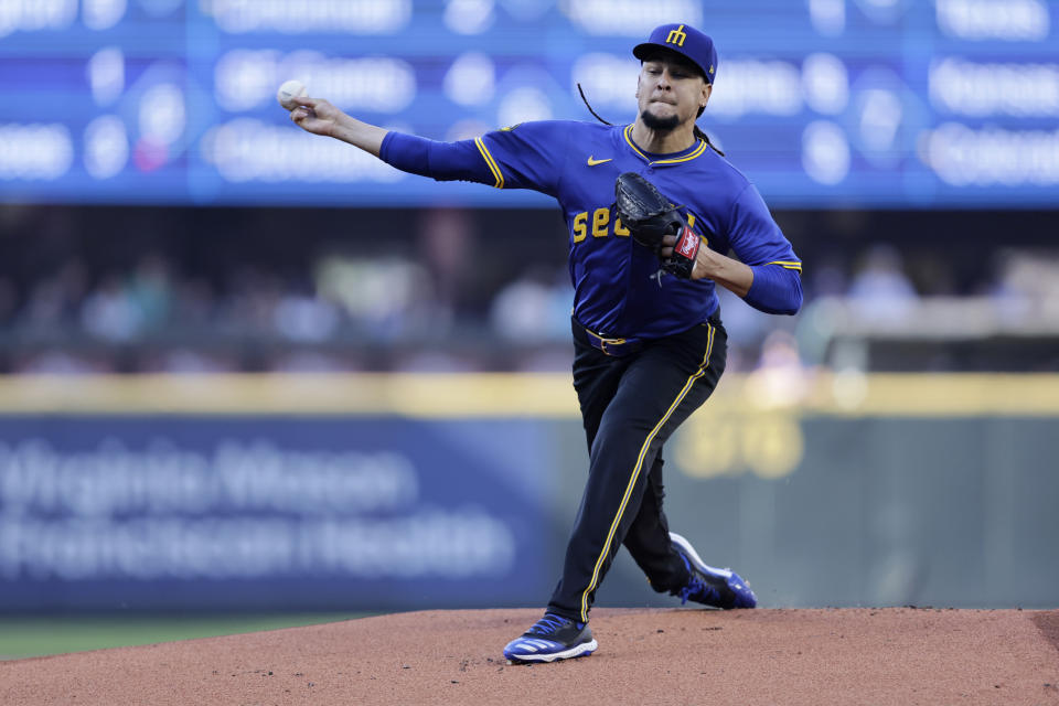 Seattle Mariners starting pitcher Luis Castillo throws against the Toronto Blue Jays batter during the first inning in a baseball game, Friday, July 5, 2024, in Seattle. (AP Photo/John Froschauer)