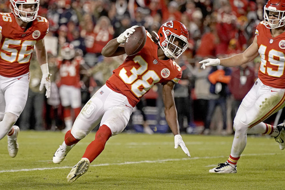 Kansas City Chiefs cornerback L'Jarius Sneed (38) runs the ball after catching an interception late in the second half of an NFL football game against the Dallas Cowboys, Sunday, Nov. 21, 2021, in Kansas City, Mo. The Chiefs won 19-9. (AP Photo/Charlie Riedel)