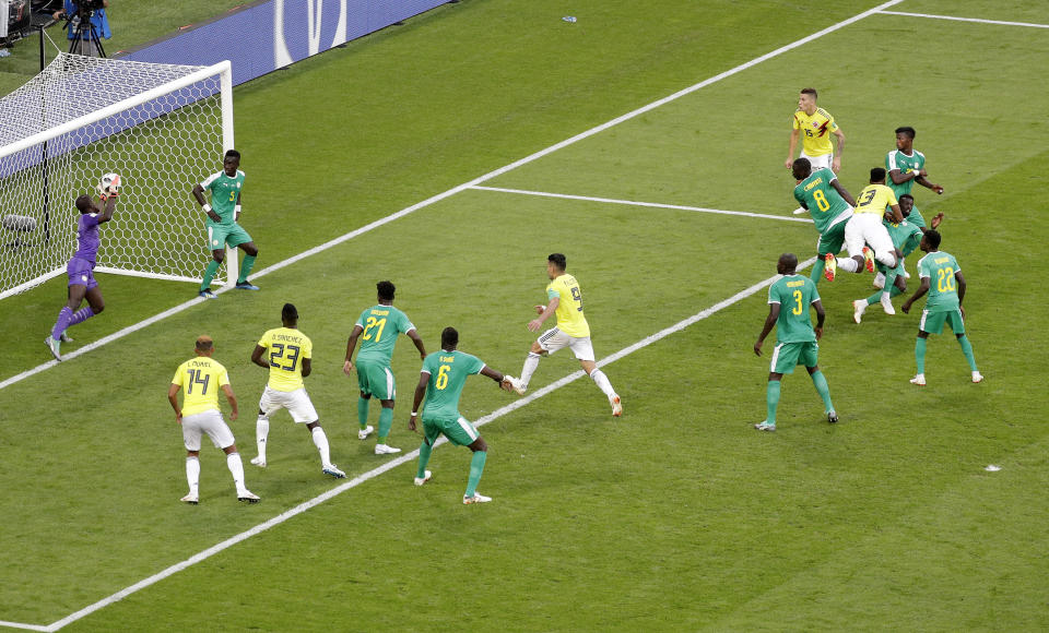 Colombia’s Yerry Mina scores the goal that sends Senegal out of the World Cup