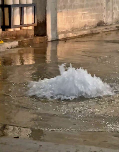 PHOTO: A drain bursts, while an outer ring of Hurricane Ian moved over the area on Sept. 26, 2022 in Miami. (ABC News)