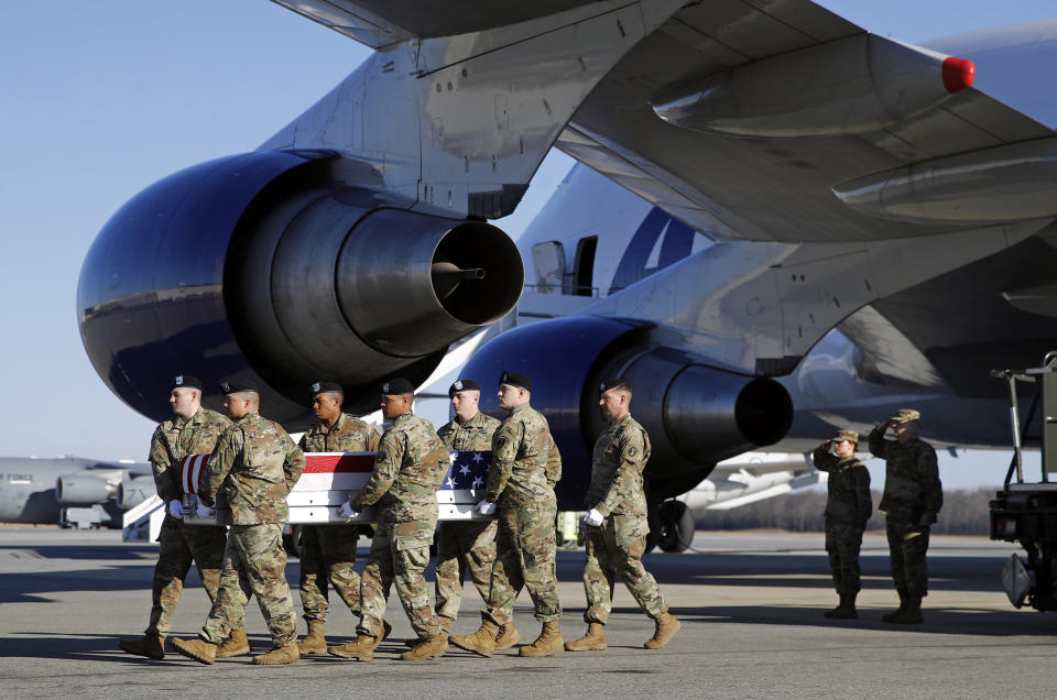 A U.S. Army carry team moves a transfer case containing the remains of Spc. Joseph P. Collette, Sunday, March 24, 2019, at Dover Air Force Base, Del. According to the Department of Defense, Collette, of Lancaster, Ohio, was killed March 22 while involved in combat operations in Kunduz Province, Afghanistan. (AP Photo/Patrick Semansky)