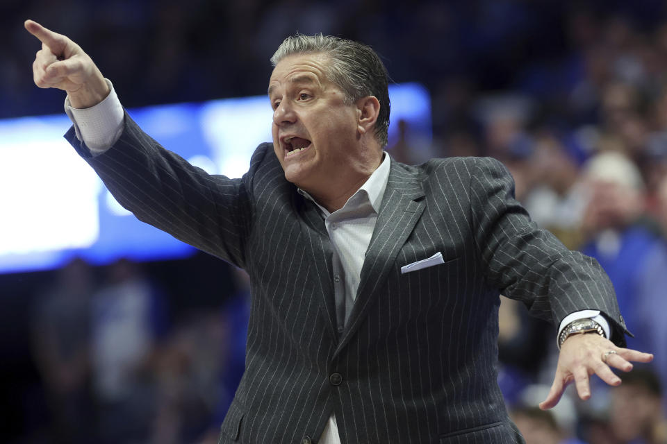 FILE - Kentucky coach John Calipari gestures during the second half of the team's NCAA college basketball game against LSU in Lexington, Ky., Feb. 23, 2022. Calipari's push for upgraded practice facilities for his Kentucky’s men’s basketball team drew a sharp jab from Wildcats football coach Mark Stoops on Twitter after Calipari referred to the university as a “basketball school” in an interview. (AP Photo/James Crisp, File)