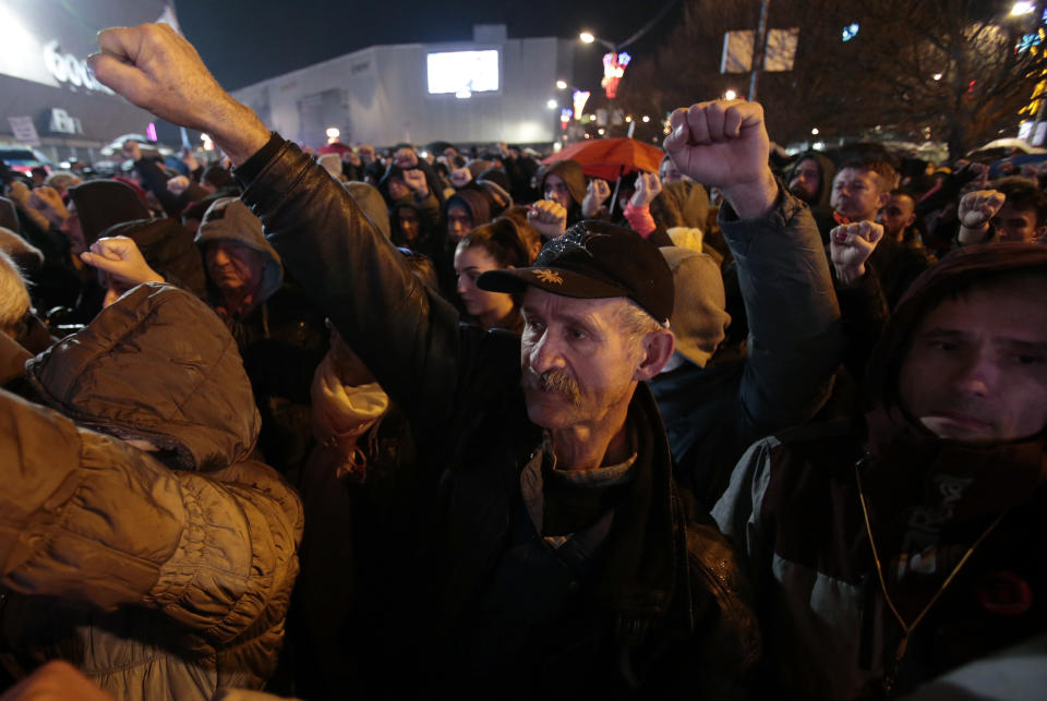 Protesters shout slogans including "Justice for David" during protest, in Banja Luka, Bosnia on Sunday, Dec. 30, 2018. Several thousand Bosnians have rallied in support of the man whose quest for the truth about his son’s death has turned into a wider movement for justice and rule of law in the Balkan country. The protest on Sunday demanded the ouster of Bosnian Serb Interior Minister Dragan Lukac and top police officials over the death in March of 21-year-old David Dragicevic. (AP Photo/Amel Emric)