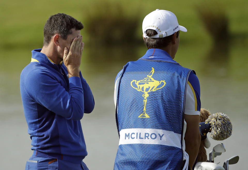 Europe's Rory McIlroy reacts on the 18th hole after a singles match on the final day of the 42nd Ryder Cup at Le Golf National in Saint-Quentin-en-Yvelines, outside Paris, France, Sunday, Sept. 30, 2018. Europe's Rory McIlroy lost to Justin Thomas of the US. (AP Photo/Matt Dunham)