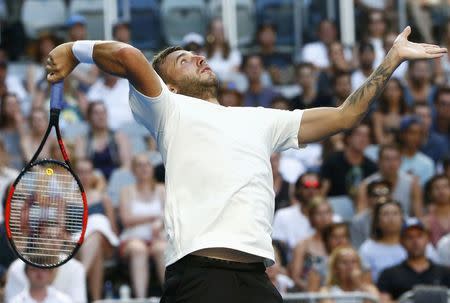 Tennis - Australian Open - Melbourne Park, Melbourne, Australia - 22/1/17 Britain's Daniel Evans hits a shot during his Men's singles fourth round match against France's Jo-Wilfried Tsonga. REUTERS/Edgar Su