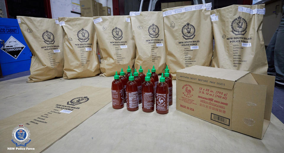 A NSW police photo of the bottles of chilli sauce where 400kgs of methylamphetamine was being concealed.