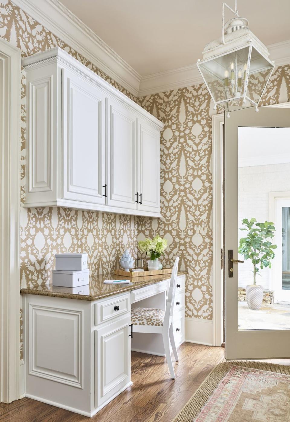 <p>Wallpaper may have had a hiatus since its popularity surge in the ‘70s and ‘80s, but in 2023, it’s expected to soar once more. “Wallpaper can add just the right interest and punch to an otherwise simple office space,” says Maggie Griffin, founder of <a href="https://www.maggiegriffindesign.com/" rel="nofollow noopener" target="_blank" data-ylk="slk:Maggie Griffin Design;elm:context_link;itc:0" class="link ">Maggie Griffin Design</a>. “Adding in a pattern on the walls, a comfy chair, and a few well-styled accessories can make all the difference.”</p>