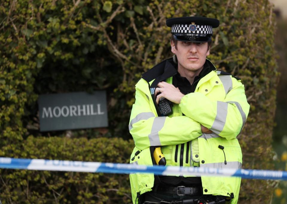 A police officer at the cordon at the junction of Moor Lane and Langham Lane in Gillingham, Dorset during the investigation (PA) (PA Archive)