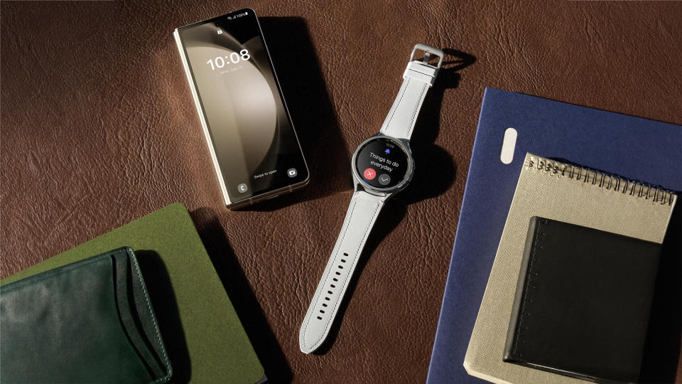 Official lifestyle image of the Samsung Galaxy Watch 6 along with other Samsung products