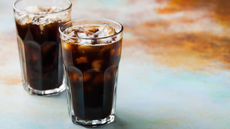 Glasses of soda and coffee