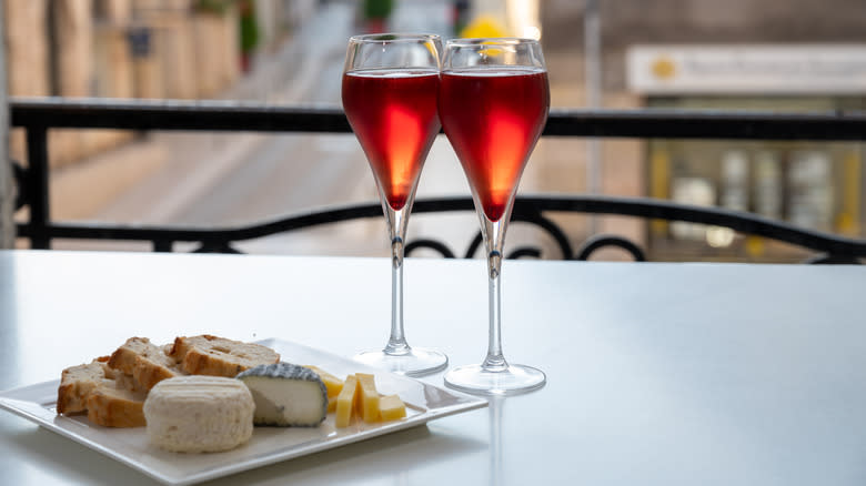 Kir royale cocktails on a balcony