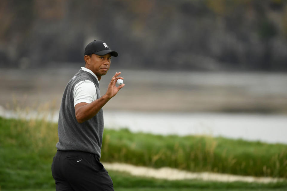 PEBBLE BEACH, CALIFORNIA - JUNE 13: Tiger Woods of the United States waves to the crowd during the first round of the 2019 U.S. Source: Getty