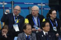 Curling - Pyeongchang 2018 Winter Olympics - Women's Final - Sweden v South Korea - Gangneung Curling Center - Gangneung, South Korea - February 25, 2018 - Sweden's King Carl Gustav (rear C) watches the match. REUTERS/Phil Noble
