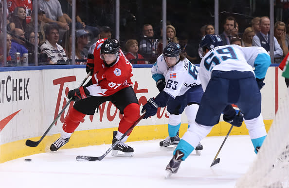 TORONTO, ON - SEPTEMBER 21: Sidney Crosby #87 of Team Canada stickhandles the puck with pressure from Mats Zuccarello #63 of Team Europe during the World Cup of Hockey 2016 at Air Canada Centre on September 21, 2016 in Toronto, Ontario, Canada. (Photo by Andre Ringuette/World Cup of Hockey via Getty Images)