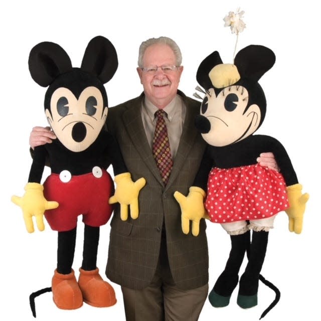 Ted Hake of Pennsylvania, operator of Hake's Auctions of popular culture items, stands next to a pair of Walt Disney related items he once sold at auction for $150,000. Hake is the sponsor for "The Big Show," coming to MAPS Air Museum on Oct. 27-28.