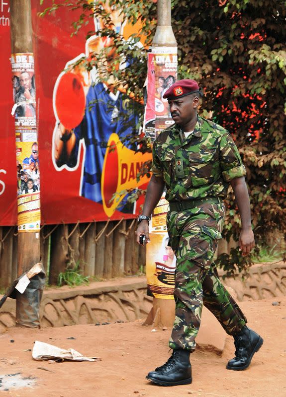 FILE PHOTO: Muhoozi Kainerugaba, a son of Uganda's President Yoweri Museveni, arrives at the scene of a blast in Kampala