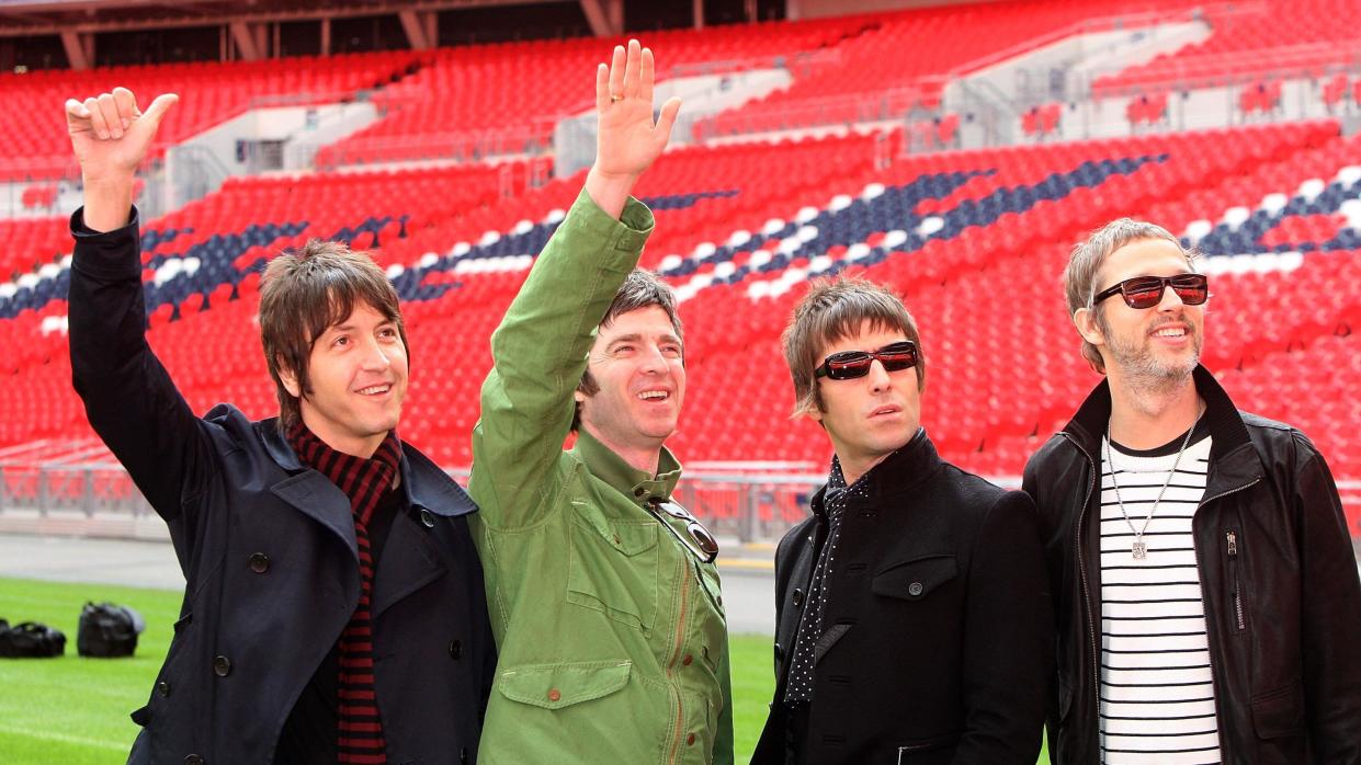 Oasis the band pictured smiling in 2008