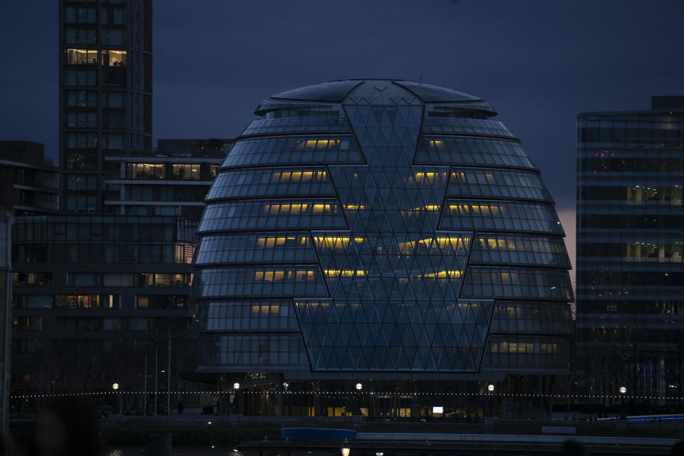 A view of City Hall on the South Bank of the River Thames in London, Saturday, March 6, 2021. Brexit and the coronavirus pandemic have hit London in a perfect storm. On May 6, Londoners will elect a mayor, whose performance will help determine whether this is the start of a period of decline for Europe's biggest city — or a chance to do things better. Current Mayor Sadiq Khan, who is favored to win re-election, says his top priority is preserving jobs threatened by the economic blow of the pandemic. Rival Shaun Bailey says his top priority is crime. Whoever wins will face the challenge of leading London's fightback from its biggest shock for generations. (AP Photo/Alastair Grant)