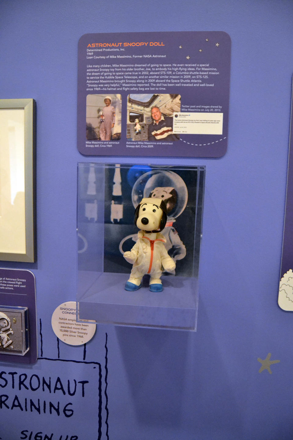 A plush astronaut Snoopy doll that flew to the International Space Station in 2019 is seen for the first time on display as part of the new exhibit 