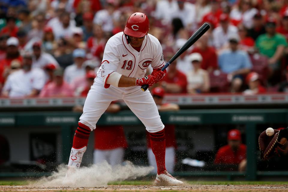 Cincinnati Reds first baseman Joey Votto (19) watches a pitch in the dirt for a ball in the sixth inning of the MLB National League game between the Cincinnati Reds and the St. Louis Cardinals at Great American Ball Park in downtown Cincinnati on Sunday, April 24, 2022. The Reds broke an 11-game losing streak with a 4-1 win over the Cardinals. 