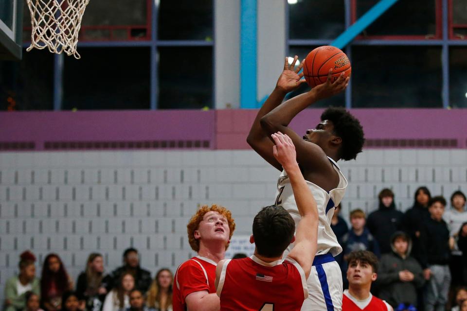 Wareham's Antoine Crosson elevates for the jumper against Old Rochester on Tuesday. On Friday, he had 10 points against Bishop Feehan.