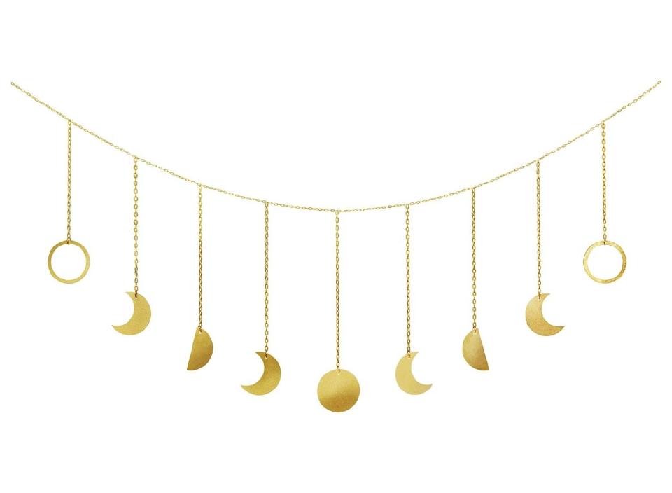 For an elegant piece of the heavens, consider this moon phase garland by Mkono. (Source: Amazon)

