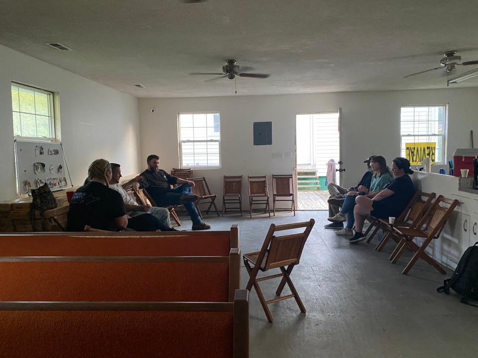 A recovery meeting at Daniel Adkins’ church in East Lynn, West Virginia (Richard Hall / The Independent)