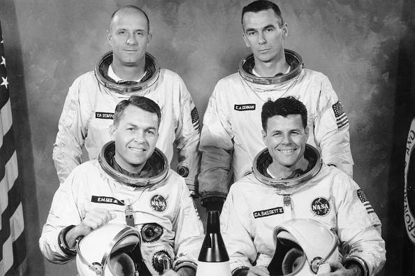 (Original Caption) Ca. 1965- Gemini 9 astronauts, command pilot Elliot M. See, Jr., (left, front) and pilot Charles A. Bassett, (right, front), were killed Feb. 28th when their T-38 jet airplane crashed into a Mcdonnell Aircraft building during a landing approach to the St. Louis airport. Astronauts Thomas D. Stafford, (left, rear), and Eugene A. Cernan, (right, rear), the backup crew for the Gemini 9 mission, landed at the airport shortly after the crash. The astronauts are shown from a file photo.