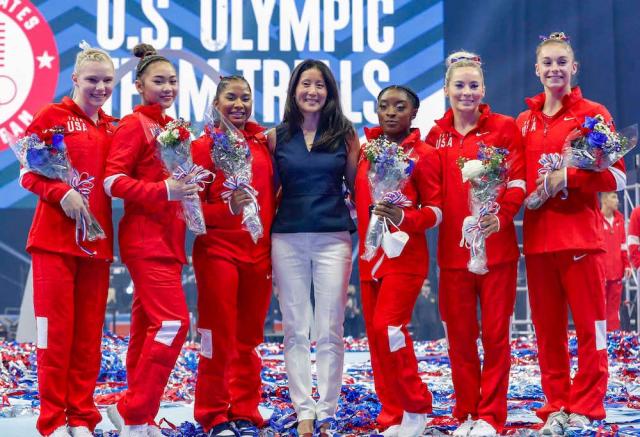 Simone Biles Takes Flight in Sporty Jumpsuit, Sleek Sneakers and