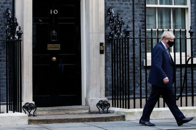 Boris Johnson outside the famous door to No.10 Downing Street (Photo: Paul Childs via Reuters)